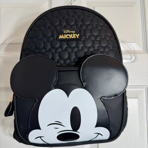 NWT. Disney Primark Mickey Mouse Embossed Backpack winking Mickey Mouse